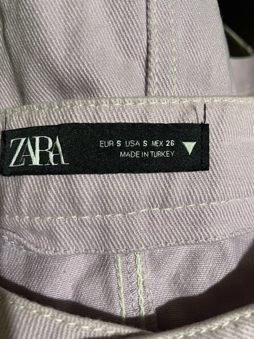 Zara Lavender Denim Mini Skirt (Category: Skirts) located in Quezon City. Submitted by venizia (Listing ID 1464392864, Image 2). Description: - Zara Lavender Denim Mini Skirt - Size: S - Made in Turkey - Classic five-pocket styling - Button and zip closure - Versatile: pairs well with t-shirts or cute tops.