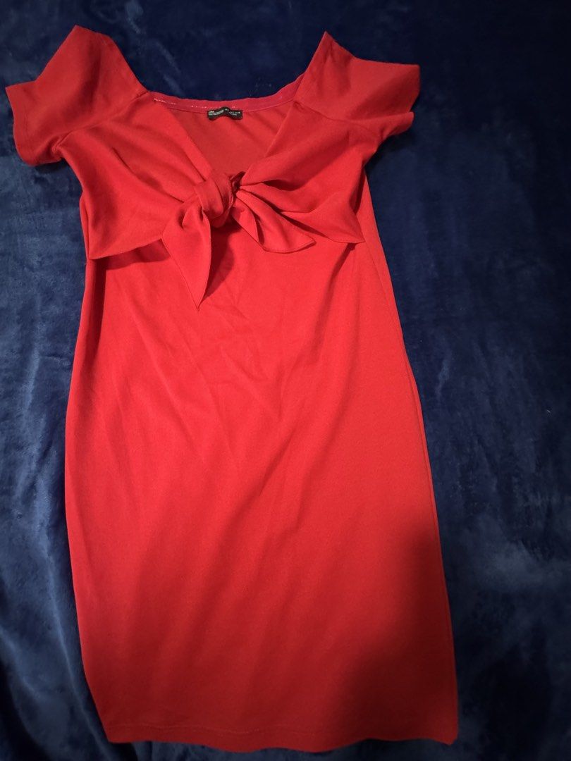 Zara Red Off-Shoulder Knot Front Dress (Category: Dresses) located in Quezon City. Submitted by candyclosetph (Listing ID 1464381913, Image 2). Description: - Zara Off-Shoulder Dress - Size: L - Features a cute knot detail at the front - Short sleeves - Made in Turkey - Ideal for night outs or parties.