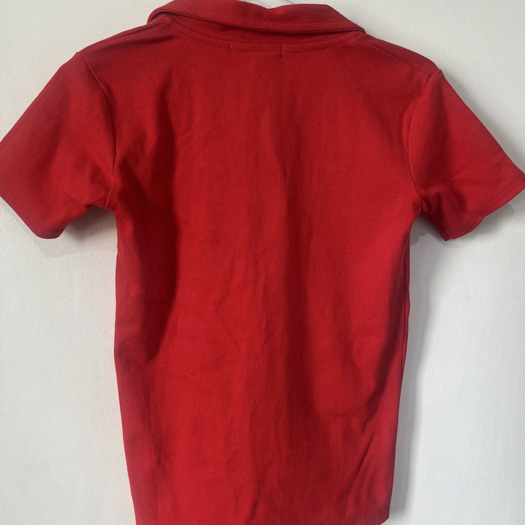 Zara Red Ribbed Polo Shirt (Category: Shirts) located in Quezon City. Submitted by shopnina (Listing ID 1464399108, Image 3). Description: - Red Zara polo shirt - Ribbed texture all over - Short sleeves with collar - Button closure at the neck - Original tag likely attached - Perfect for casual outfits -Bought online from an over…ns RFS: sized up.