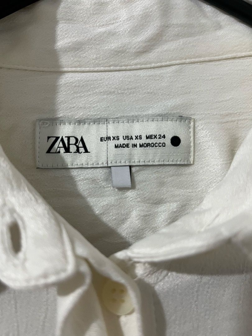 Zara White Long Sleeve Button Up White Shirt (Category: Longsleeves) located in Manila. Submitted by micahezra__ (Listing ID 1464393513, Image 2). Description: used once :) bought this around 1500 or 1600.