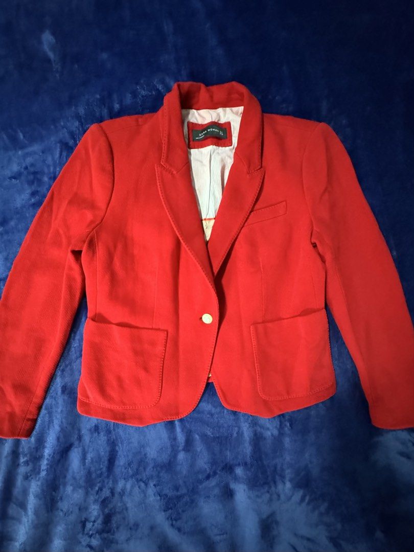 Zara Woman Red Blazer Jacket (Category: Coats, Jackets and Outerwear) located in Quezon City. Submitted by candyclosetph (Listing ID 1464381223, Image 2). Description: - Zara Woman Red Blazer - Single button closure - Two front pockets - Light cream colored lining - Made in Morocco - Perfect for dressing up or down.
