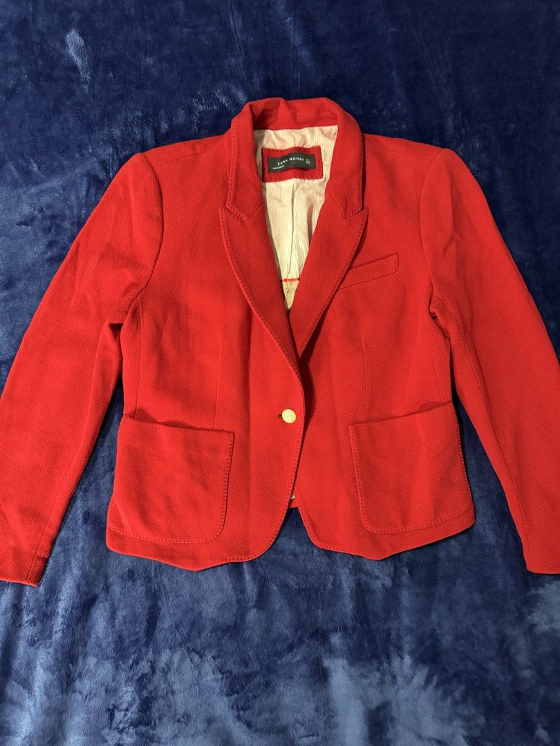 Zara Woman Red Blazer Jacket (Category: Coats, Jackets and Outerwear) located in Quezon City. Submitted by candyclosetph (Listing ID 1464381223, Image 1). Description: - Zara Woman Red Blazer - Single button closure - Two front pockets - Light cream colored lining - Made in Morocco - Perfect for dressing up or down.