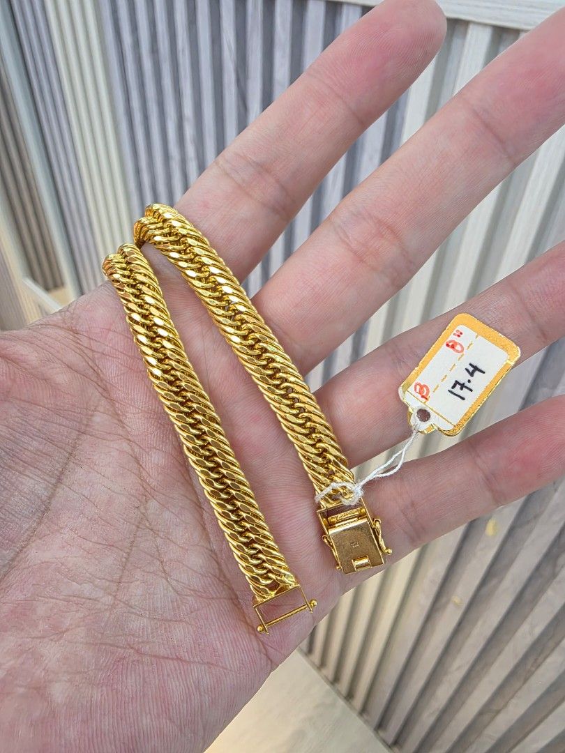 18K Gold Double Chain Bracelet 17.4g (Category: Bracelets) located in Manila. Submitted by trumpisthedevil (Listing ID 1464646439, Image 3). Description: - Genuine 18K gold bracelet - Chic double chain design for a substantial look - Secure and easy-to-use clasp - Bright, shiny gold finish - Substantial weight of 17.4 grams - Versatile for everyday wear or special events.