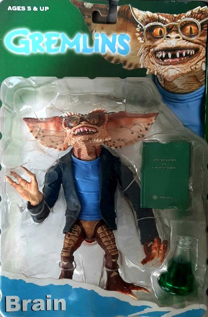 2003 NECA Reel Toys Gremlins Action Figures (Category: Action & Battle Toys) located in Liloan. Submitted by angelyneroberts_171329 (Listing ID 1464702724, Image 2). Description: FOR SALE 2003 NECA Reel Toys Gremlins Action Figures DESCRIPTION : - Gremlin with Accessories. A 7-inch scale Gremlin figure featuring a black jacket, blue shirt, book, and green flask. - Poker Player Gremlin. A Gremlin figure that comes with miniature playing cards and 