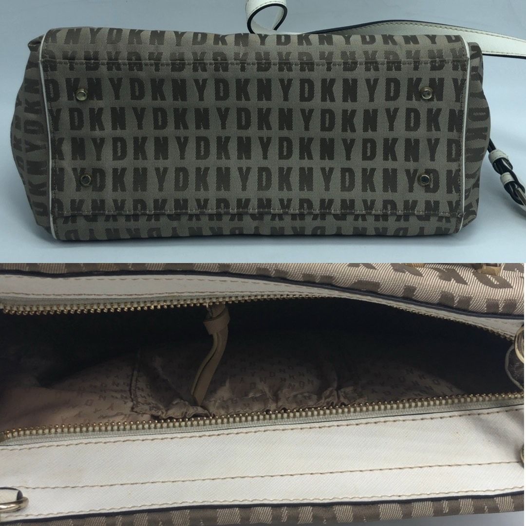 267009540 DKNY BAG CANVAS BOSTON BAG (Category: Luxury Bags & Wallets) located in Taguig. Submitted by ecoring.ph (Listing ID 1464590635, Image 3). Description: ◆CONDITION: B ◆DESCRIPTIONS: (Other defects/info:) OUTER: The canvas body of the bag is stained and dirty, and shows signs of use. The bottom and bottom corners of the bag are stained and dirty, and show signs of use. The leather lining of the bag is scratched, scuffed, stained, dirty, an