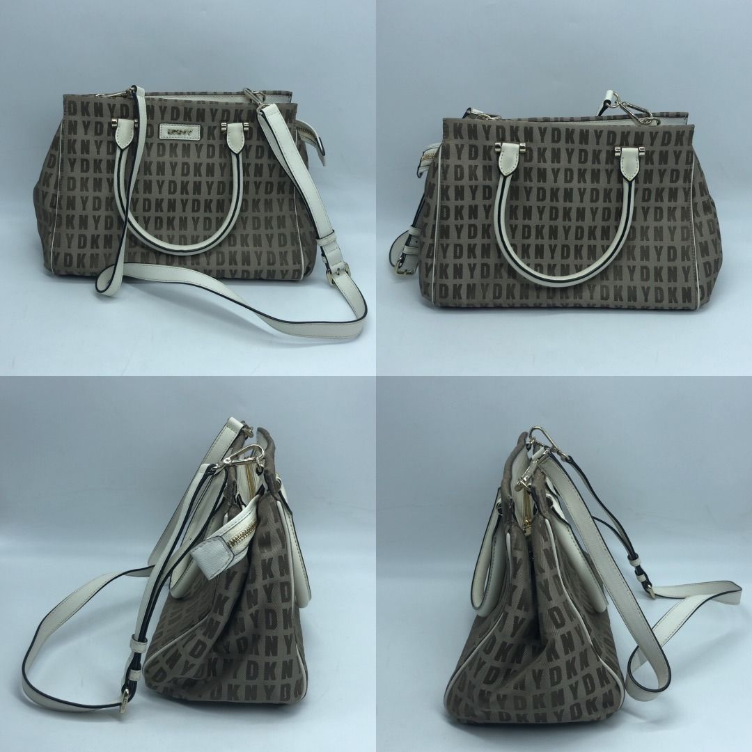 267009540 DKNY BAG CANVAS BOSTON BAG (Category: Luxury Bags & Wallets) located in Taguig. Submitted by ecoring.ph (Listing ID 1464590635, Image 2). Description: ◆CONDITION: B ◆DESCRIPTIONS: (Other defects/info:) OUTER: The canvas body of the bag is stained and dirty, and shows signs of use. The bottom and bottom corners of the bag are stained and dirty, and show signs of use. The leather lining of the bag is scratched, scuffed, stained, dirty, an