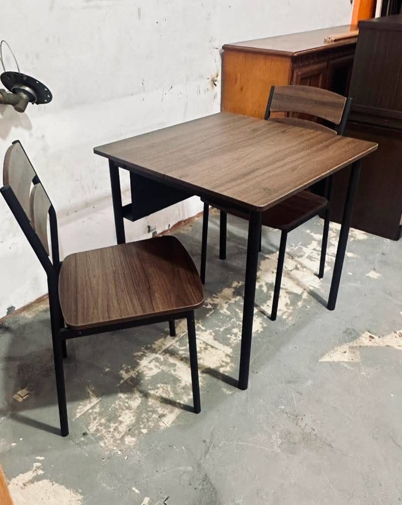 2 Seater Dining Table and Chairs Set (Category: Tables & Sets) located in Quezon City. Submitted by dannikkishoppe2 (Listing ID 1464695036, Image 3). Description: 2 Seater Dining Table and Chairs Set ‼️₱4800‼️ Simple. Stylish. Space-saving. 🤎 Perfect for a small dining area, condo, apartment, or minimalist home. 🤎 Warm wood finish 🖤 Sleek black metal legs ✨ Clean & modern design 🇯🇵 Japan surplus — used but in excellent condition Please manag