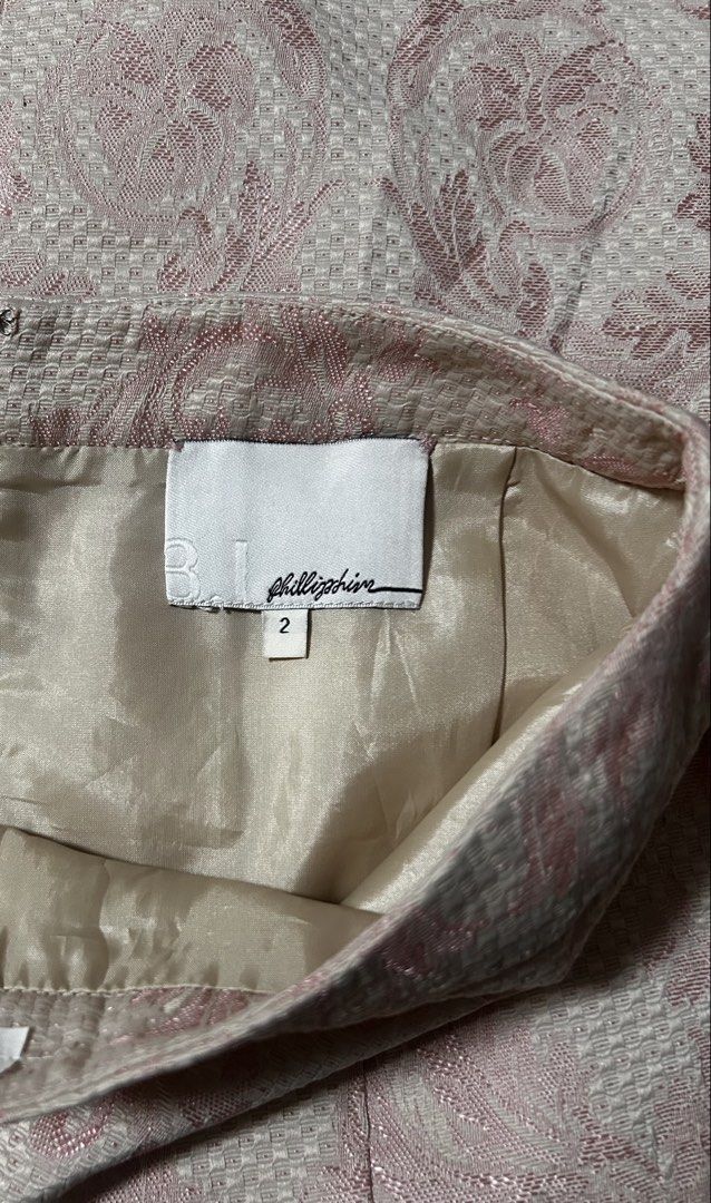 3.1 PHILIPP LIM (Category: Skirts) located in Davao. Submitted by sart0ria85 (Listing ID 1464643635, Image 3). Description: A small size pencil skirt in shellnut pink with embossed baroque style imprints. Derails are removed. SMALL. Size 2-4 EXCELLENT CONDITION (94/100) No issues..