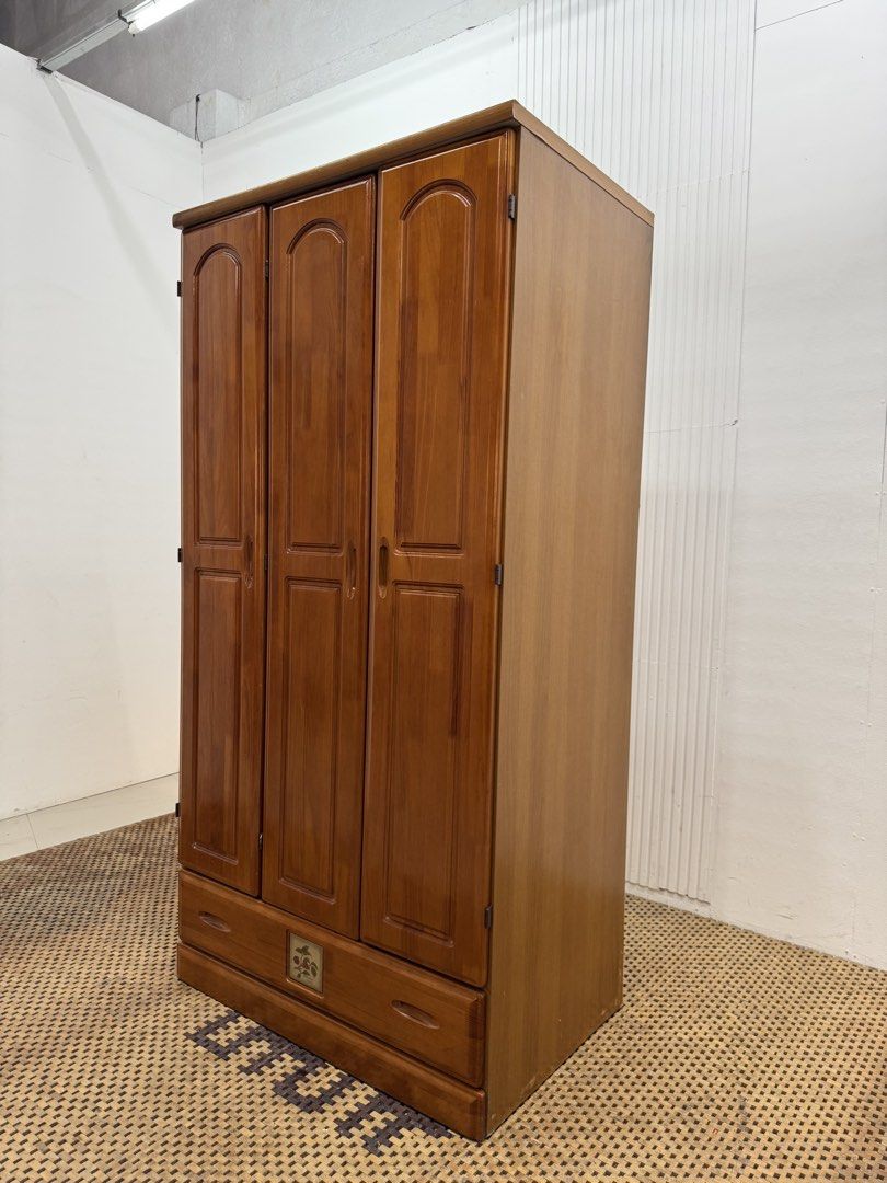 3 door wardrobe (Category: Shelves, Cabinets & Racks) located in Quezon City. Submitted by matetdevis13 (Listing ID 1464640356, Image 3). Description: Wooden 3-Door Wardrobe with a Drawer Price: 10,500 L35.5 x W23 x H70 In good condition Code MJS50-R7.