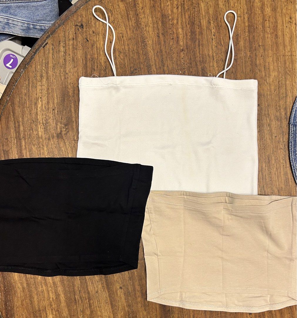 3-Piece Basic Tube Top Bundle (Category: Others Tops) located in Antipolo. Submitted by tshopph (Listing ID 1464604358, Image 2). Description: 3-Piece Basic Neutral Tube Top Bundle Essential neutral wardrobe staples! Perfect for everyday innerwear, layering under oversized shirts, blazers, cardigans, or wearing on their own with high-waisted shorts and jeans. ✨ Colors: white, black, nude/beige ✨ Material: stretchy, comfortable cotton blend ✨ Styl