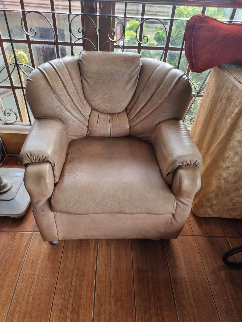 3-Seater Sofa and Armchair Set (Category: Sofas) located in Quezon City. Submitted by rl_minimalist (Listing ID 1464615852, Image 2). Description: - Comfortable sofa set: includes a 3-seater sofa and a matching armchair. - Upholstered in a light beige fabric. - Armchair shows some wear and tear, as pictured. - Still in good, usable condition with plenty of life left. - Ideal for living rooms or lounge areas..