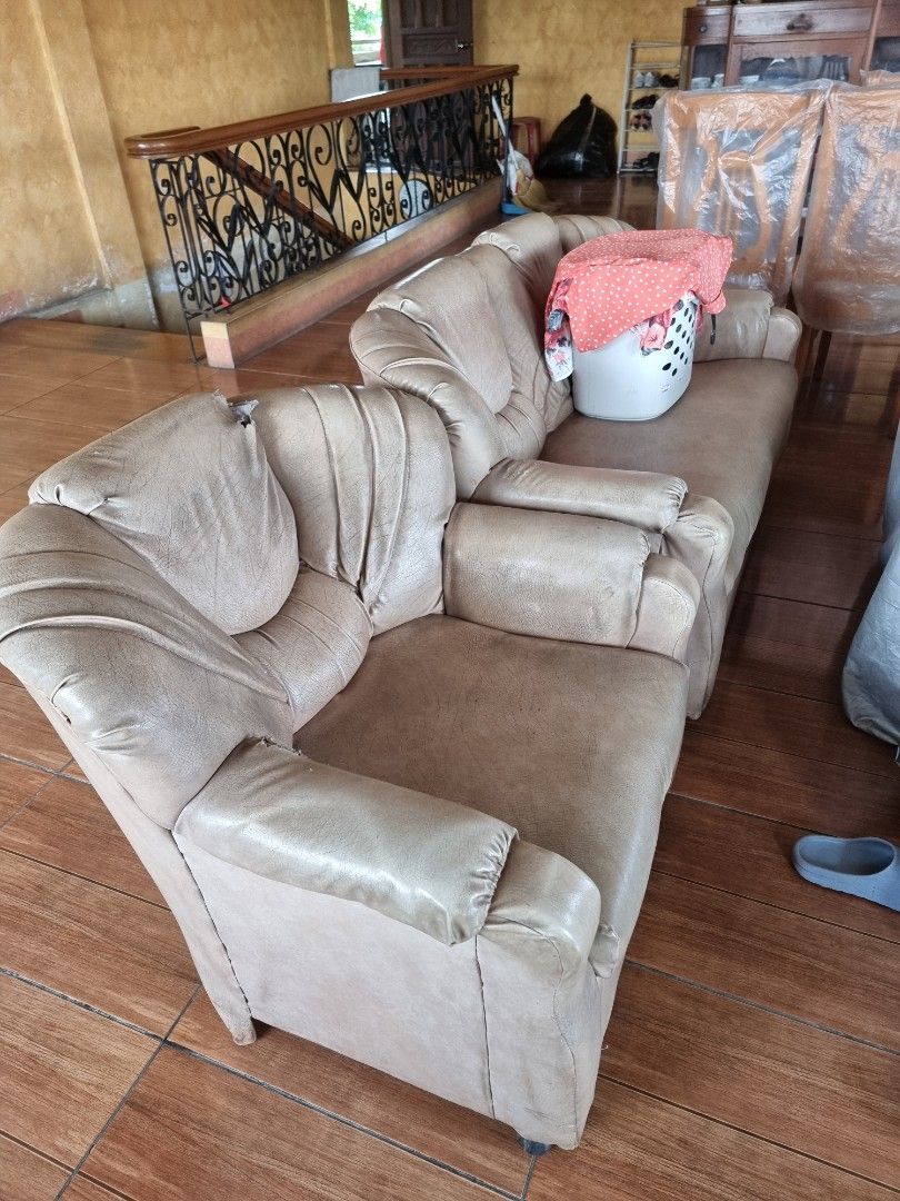3-Seater Sofa and Armchair Set (Category: Sofas) located in Quezon City. Submitted by rl_minimalist (Listing ID 1464615852, Image 1). Description: - Comfortable sofa set: includes a 3-seater sofa and a matching armchair. - Upholstered in a light beige fabric. - Armchair shows some wear and tear, as pictured. - Still in good, usable condition with plenty of life left. - Ideal for living rooms or lounge areas..