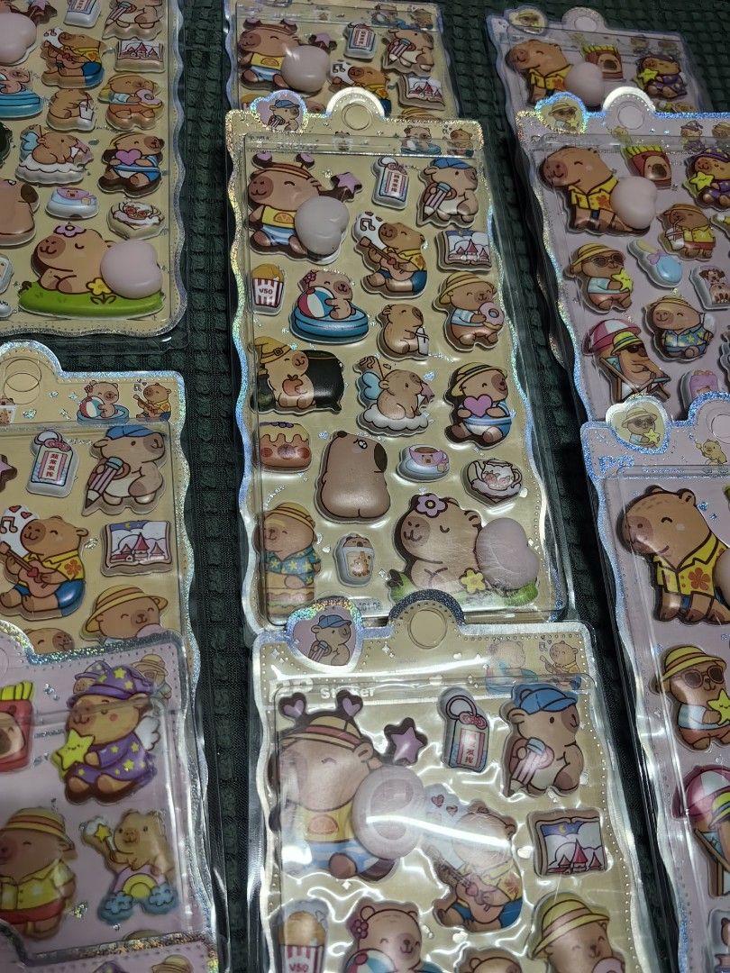 55each Cute Capybara 3D Puffy Stickers (Category: Designer & Blind Box Toys) located in Rizal. Submitted by gkstcenit (Listing ID 1464692101, Image 1). Description: - Authentic Capybara 3D puffy stickers in original packaging - Features cute designs: swimming, music, Hawaiian shirts, and snacks - Textured surface with fun raised bubble elements - Perfect for journaling, decorating phone cases, notebooks, and scrapbooking - Multiple sheets availab