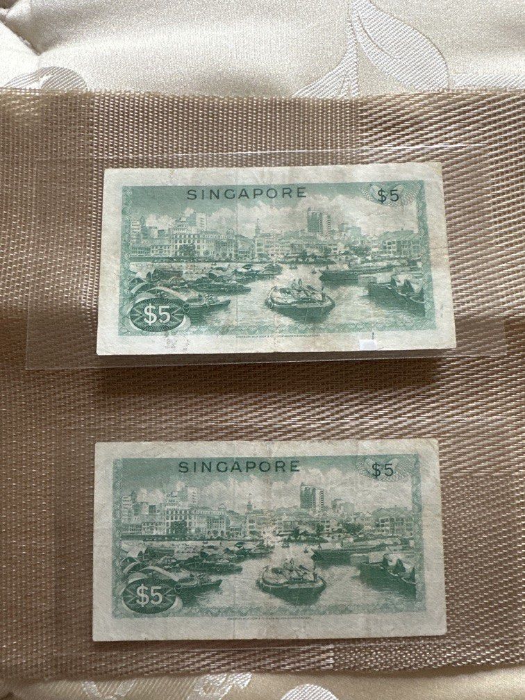 $5 orchid notes (Category: Currency) located in Singapore. Submitted by chris911.com (Listing ID 1464617521, Image 2). Description: Selling both $5 orchid notes @$68 VF with repaired condition Not for fussy collectors Provide Free mailing or meetup @ Sembawang MRT..