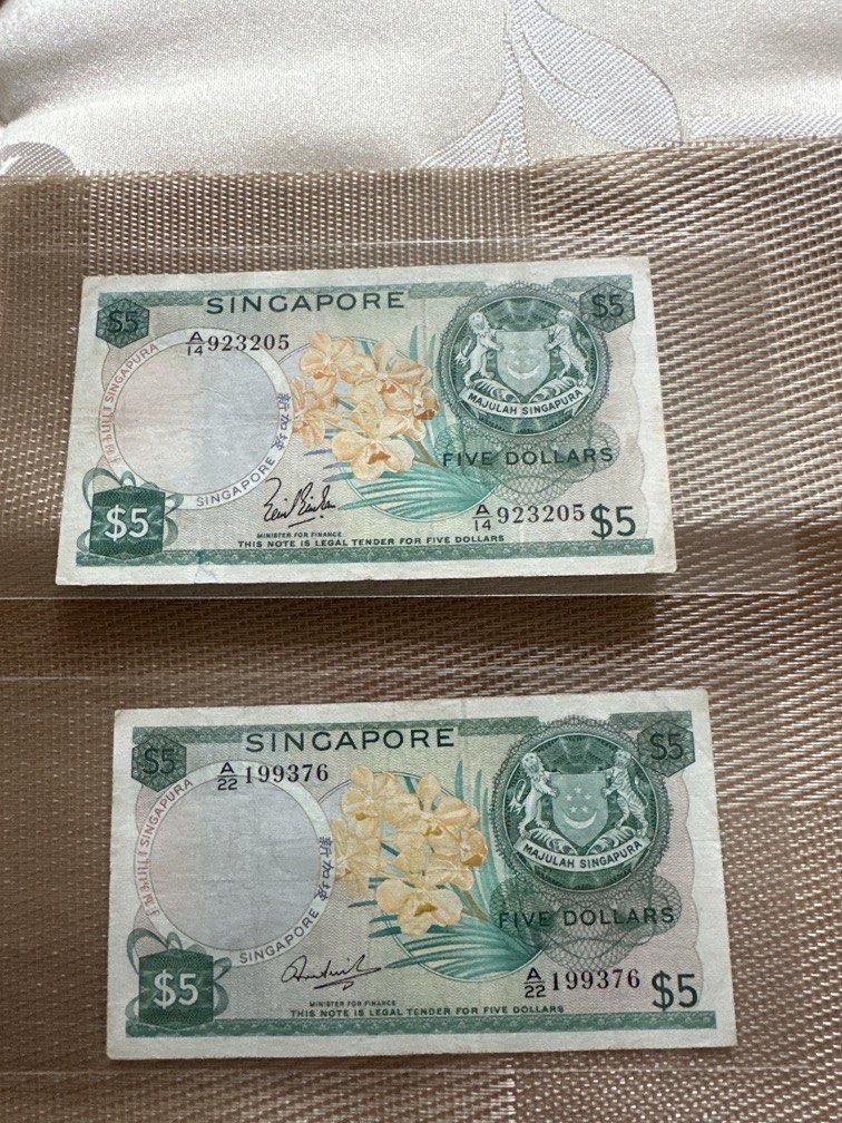 $5 orchid notes (Category: Currency) located in Singapore. Submitted by chris911.com (Listing ID 1464617521, Image 1). Description: Selling both $5 orchid notes @$68 VF with repaired condition Not for fussy collectors Provide Free mailing or meetup @ Sembawang MRT..