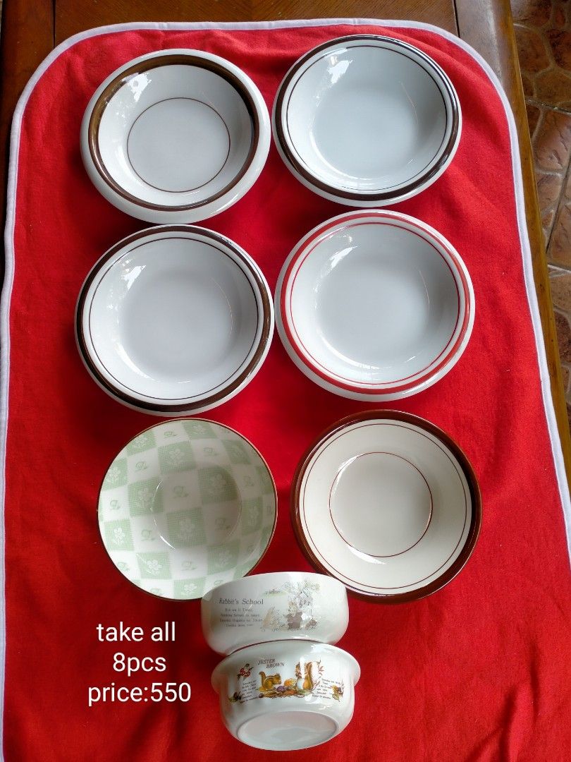8pcs Ceramic Bowls and Plates Set (Category: Dinnerware & Cutlery) located in Manila. Submitted by margeventa (Listing ID 1464637298, Image 1). Description: Selling a set of 8 ceramic bowls and plates. Includes 4 plates with brown or orange rims, measuring 8"/1" and 6.8"/1.8" deep. Also includes 4 bowls: one with a green apple & flower design (6"/2.5" deep), one Jester brown shallow bowl (5"/1.5" deep), and one Rabbit School shallow bowl (4.8"/1.