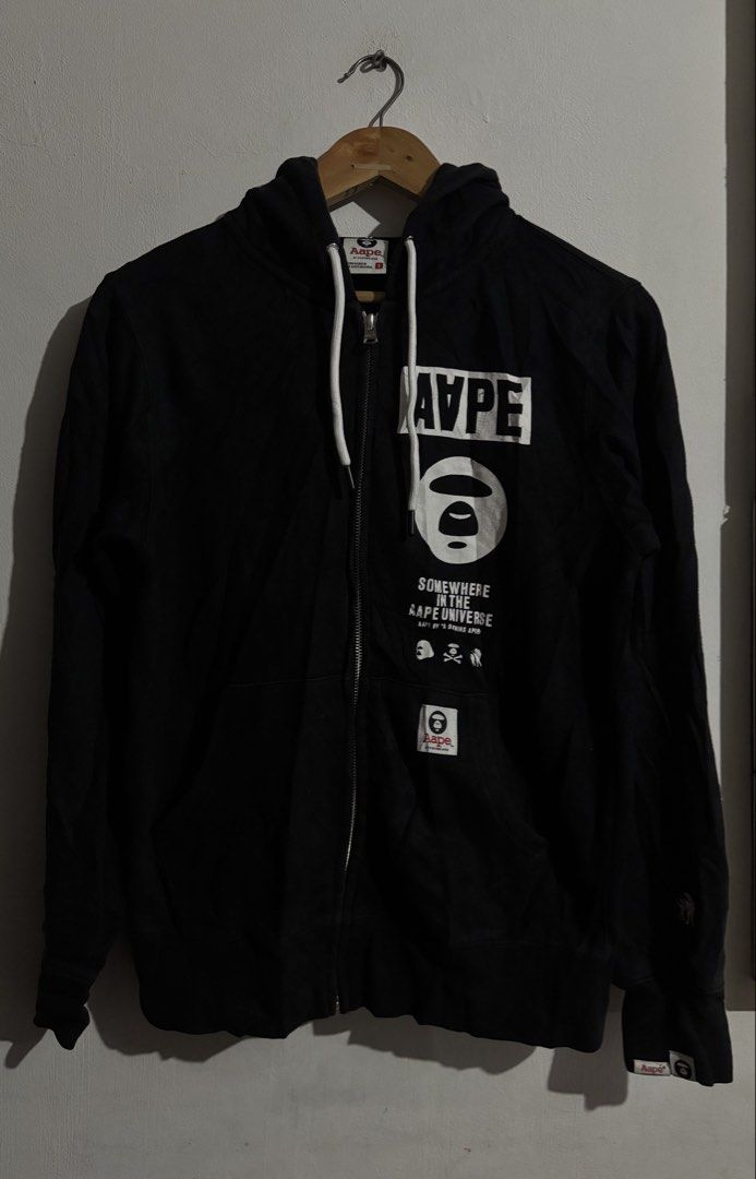 AAPE By A Bathing Ape Black Zip Hoodie (Category: Coats, Jackets and Outerwear) located in Naga. Submitted by ajrc.shop (Listing ID 1464695987, Image 1). Description: Aape Universe hoodie ✅Size: S ✅Width: 19 ✅Length: 25 ✅Color Rate: 9/10 ✅Issue: Last pic ✅Need Wash ✅Location: Bicol Naga City, Camarines Sur ✅Courier: J&T Express/Flash Express ✅MOP: Gcash only.