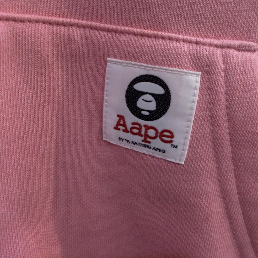 Aape Pink Patch Hoodie (Category: Hoodies) located in Manila. Submitted by jerichomal82553 (Listing ID 1464750950, Image 3). Description: Aape Pink Patch Hoodie 20 by 24 Excellent Condition Complete Tags CLAIM 2k.