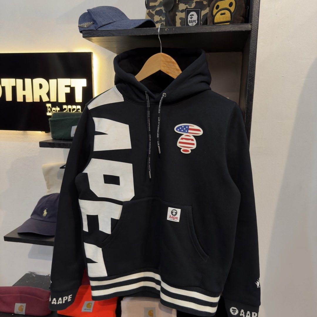 Aape USA Patch Black Hoodie (Category: Hoodies) located in Manila. Submitted by jerichomal82553 (Listing ID 1464751017, Image 2). Description: Aape USA Patch Black Hoodie 20 by 24.5 Excellent Condition Complete Tags CLAIM 2k.