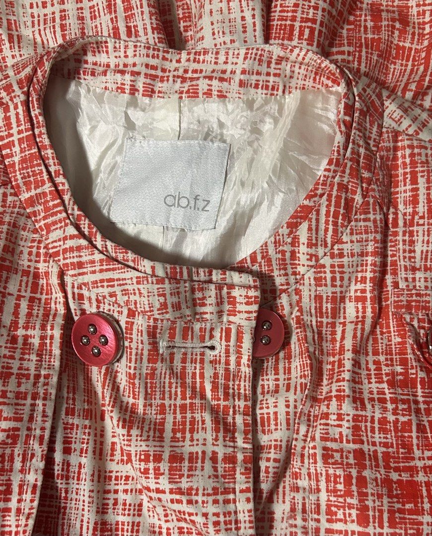 ABFZ (Category: Coats, Jackets and Outerwear) located in Davao. Submitted by sart0ria85 (Listing ID 1464639798, Image 3). Description: Short sleeve trench coat in a 60’s orange graphic print. In 100%NOODLE Cotton MADE IN KOREA 🇰🇷 SMALL. Size 4 EXCELLENT CONDITION (94/100).