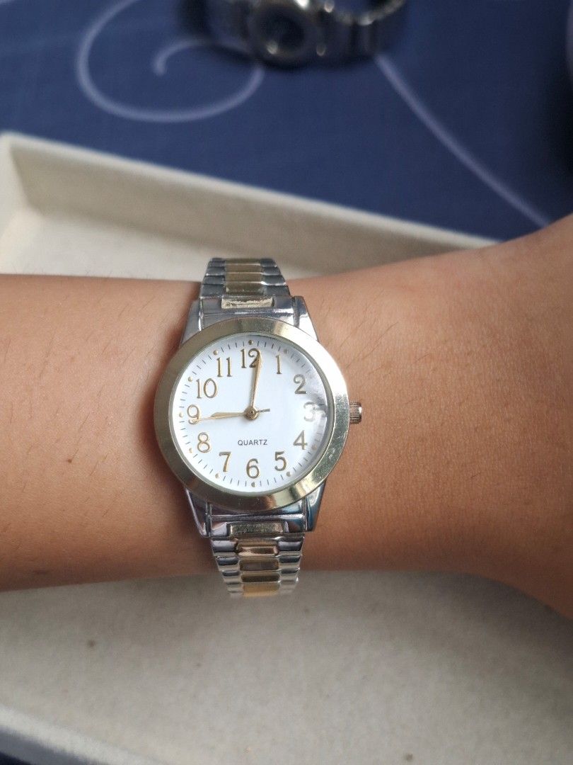 Accutime 2tone Watch (Category: Women's Watches) located in Abucay. Submitted by icia_marie18 (Listing ID 1464576360, Image 3). Description: Accutime Stretchy Watch 2tone issue: minor hairline scratch as a sign of usage price nego japan movement.