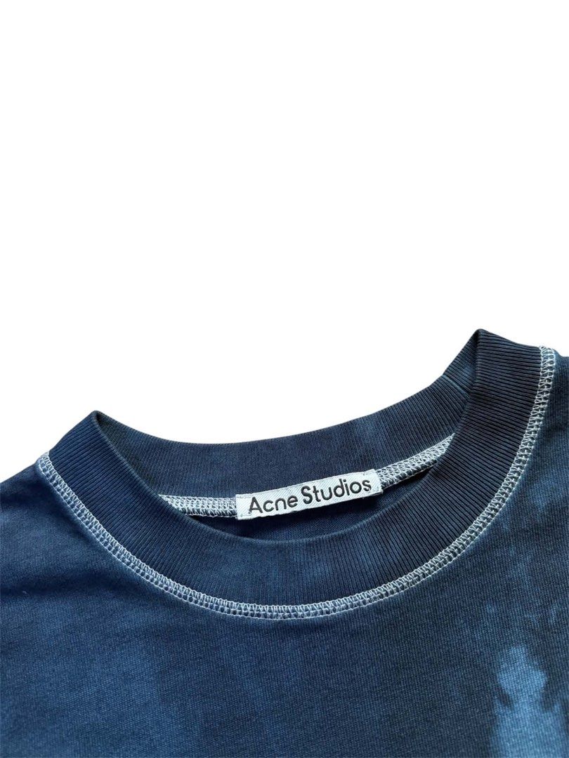Acne Studios Oversized Tie-Dye Cotton T-Shirt (Category: Shirts) located in General Mariano Alvarez. Submitted by lounneytunes (Listing ID 1464576247, Image 3). Description: - Authentic Acne Studios T-Shirt - Eye-catching blue tie-dye pattern - Made from premium 100% cotton - Size Medium (W23xL29) - Relaxed fit for ultimate comfort - Ideal for everyday casual wear.