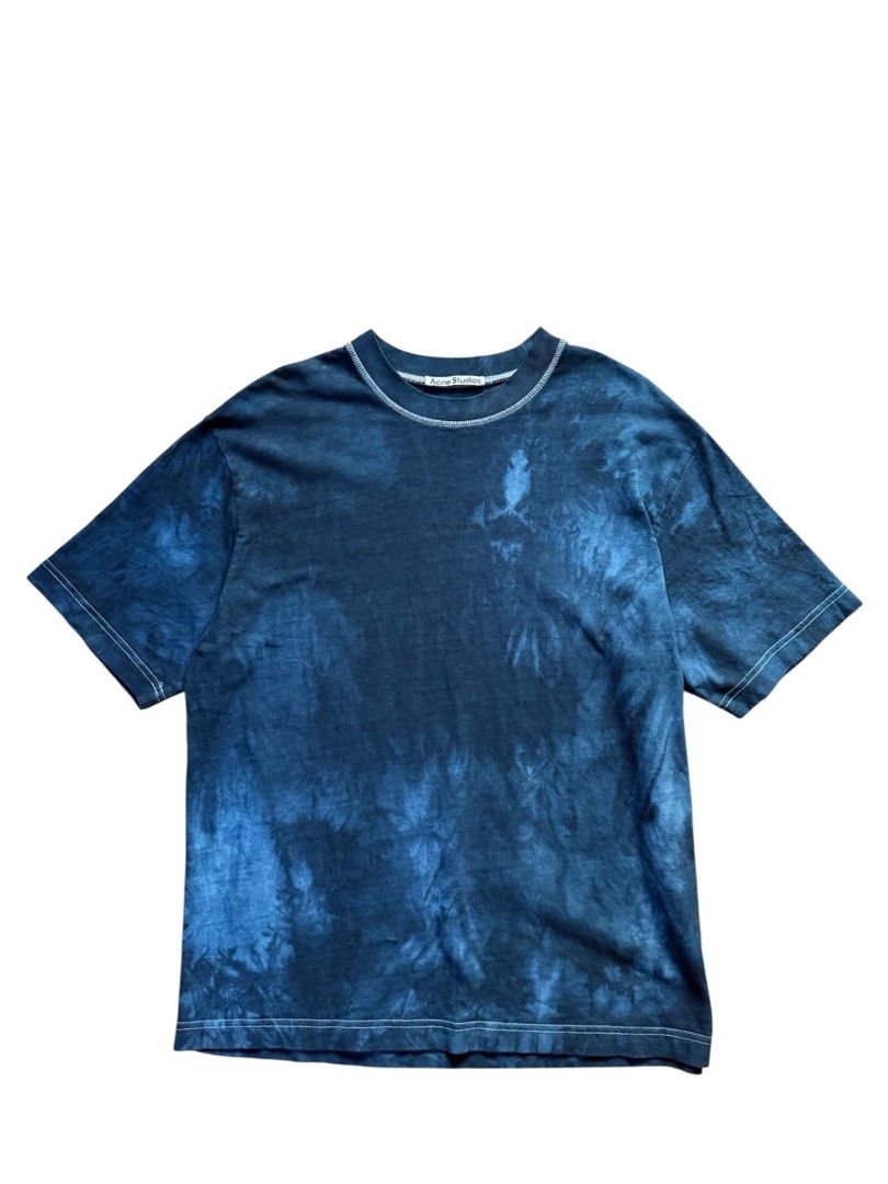Acne Studios Oversized Tie-Dye Cotton T-Shirt (Category: Shirts) located in General Mariano Alvarez. Submitted by lounneytunes (Listing ID 1464576247, Image 1). Description: - Authentic Acne Studios T-Shirt - Eye-catching blue tie-dye pattern - Made from premium 100% cotton - Size Medium (W23xL29) - Relaxed fit for ultimate comfort - Ideal for everyday casual wear.