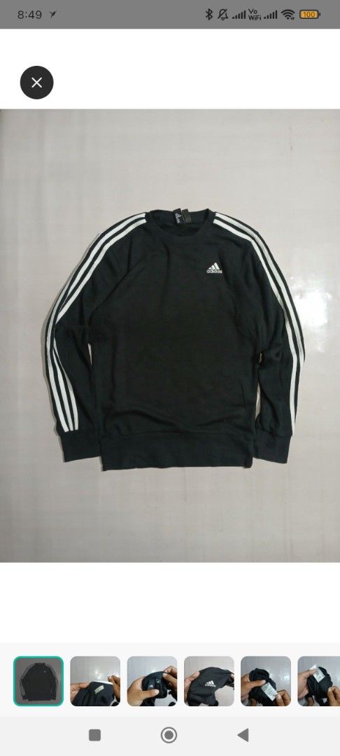 Adidas 3-Stripes Crewneck Sweatshirt (Category: Coats, Jackets and Outerwear) located in Taytay. Submitted by misspol (Listing ID 1464573623, Image 1). Description: - Classic black Adidas sweatshirt - Iconic 3-stripes on sleeves - Comfortable crewneck design - Features Adidas logo on chest - Versatile for casual wear or workouts - Tag indicates size 20 & 27.