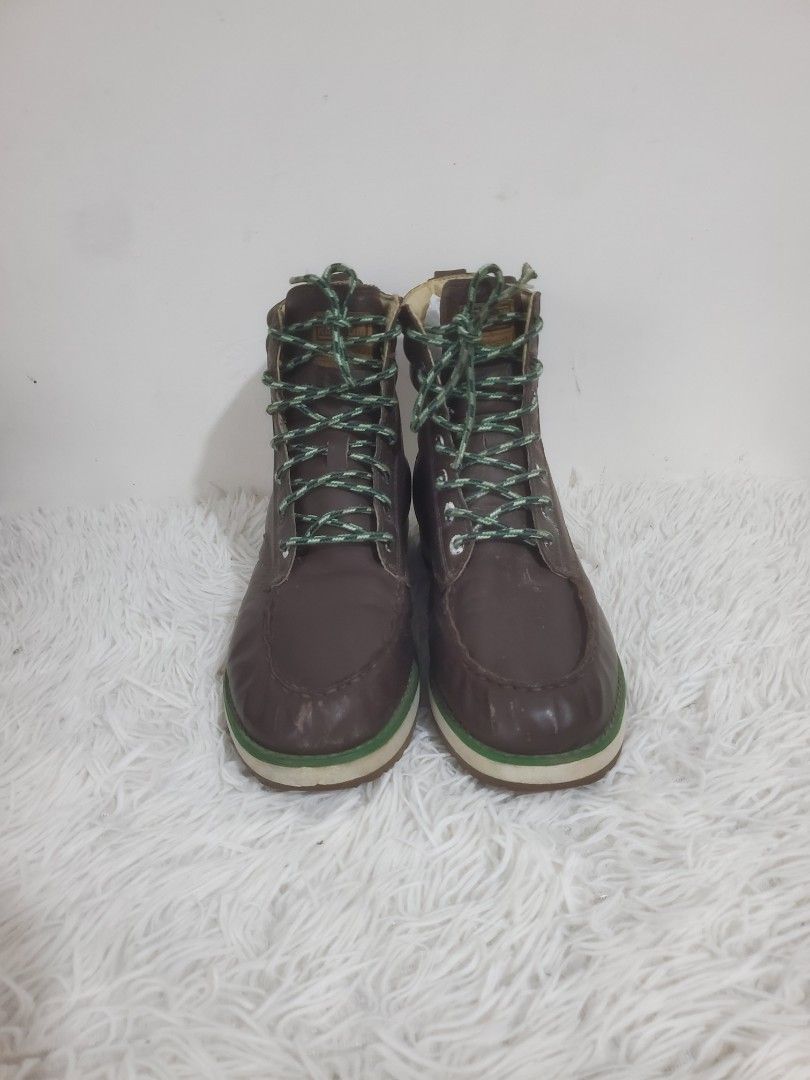 Adidas Brown Leather Lace-Up Boots (Category: Boots) located in Manila. Submitted by royalrabbit.7b2a11 (Listing ID 1464628346, Image 1). Description: - Brown leather Adidas boots - Features green laces - White and green sole with Adidas logo - Stylish and great for casual wear.