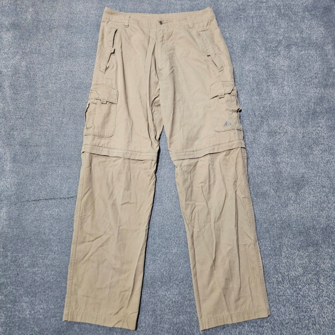 Adidas cargo convertible trousers (Category: Trousers) located in Baguio. Submitted by fadexquisite (Listing ID 1464593616, Image 1). Description: Adidas cargo convertible trousers Size med on tag Waist 30inch Length 40inch Rise 13inch Inseam 28inch Leg opening 8.5inch Excellent condition 700 plus ship fee.