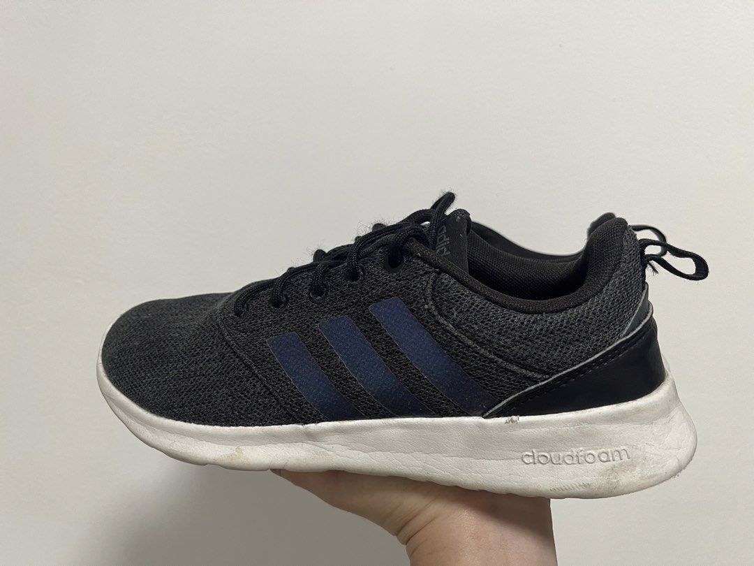 Adidas Cloudfoam Black Sneakers Size US 6.5 (Category: Sneakers) located in Caloocan City. Submitted by iamqwertyy (Listing ID 1464764842, Image 3). Description: - Brand: Adidas - Color: Black with dark grey mesh uppers and classic three stripes - Size: US 6.5 / UK 5 / FR 38 - Features: Cloudfoam cushioned soles for all-day comfort and heel pull tabs for easy wear - Condition: Worn a few times, soles have light dirt marks from normal outdoor use 