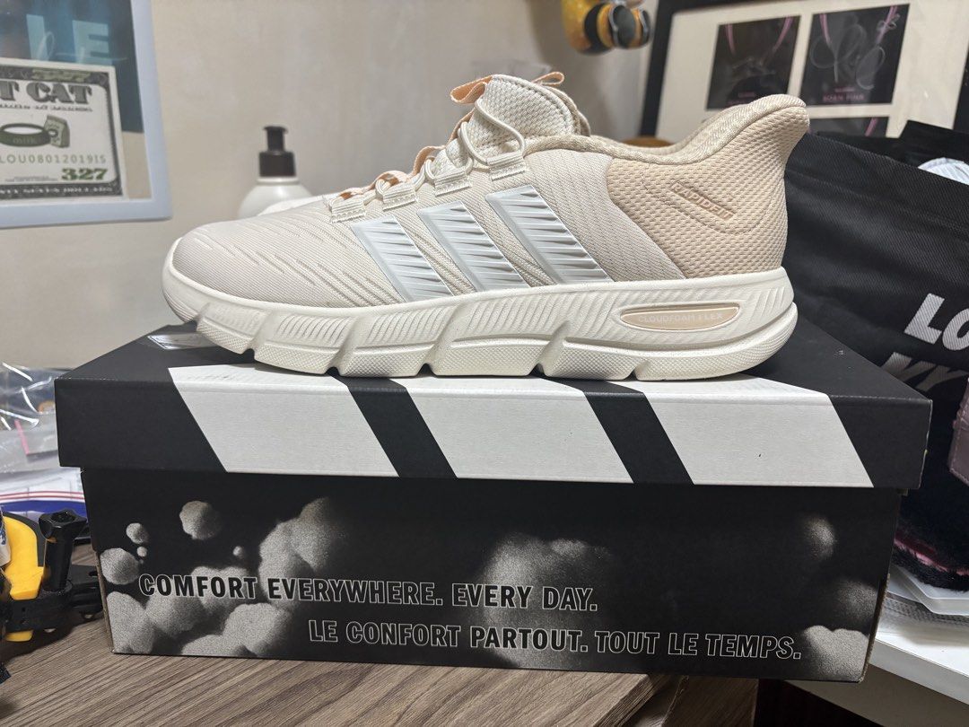 Adidas Cloudfoam Flex Rapidfit Sneakers Off White (Category: Sneakers) located in Cavite. Submitted by karlpicks (Listing ID 1464720202, Image 2). Description: - Brand: Adidas Cloudfoam Flex - Color: Off-white and pale pink - Condition: Like new, soles show zero wear (comes with original box) - Comfort: Lightweight mesh upper with plush Cloudfoam cushioning - Convenience: Slip-on design with elastic laces and heel pull tabs SIZE 9 WOMENS USED 3X 