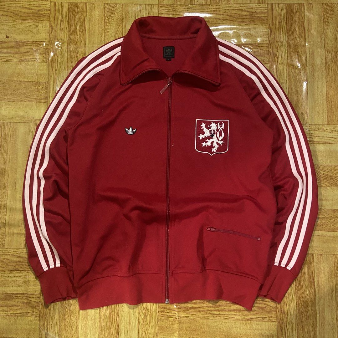 Adidas Czechoslovakia Country Track Jacket (Category: Activewear) located in Dasmarinas. Submitted by thrift2gems (Listing ID 1464587241, Image 1). Description: Adidas Czekchoslovakia County Track Jakcet✨ -WIDTH: 22 -LENGTH: 27.5 -COLOR RATE: 9.5/10 -CONDITION: 9.2/10 -ISSUE: NONE.