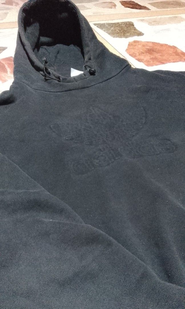 Adidas Debossed Originals Black Hooded Pullover Jacket (Category: Coats, Jackets and Outerwear) located in Binalonan. Submitted by drei67 (Listing ID 1461393149, Image 2). Description: no issues.