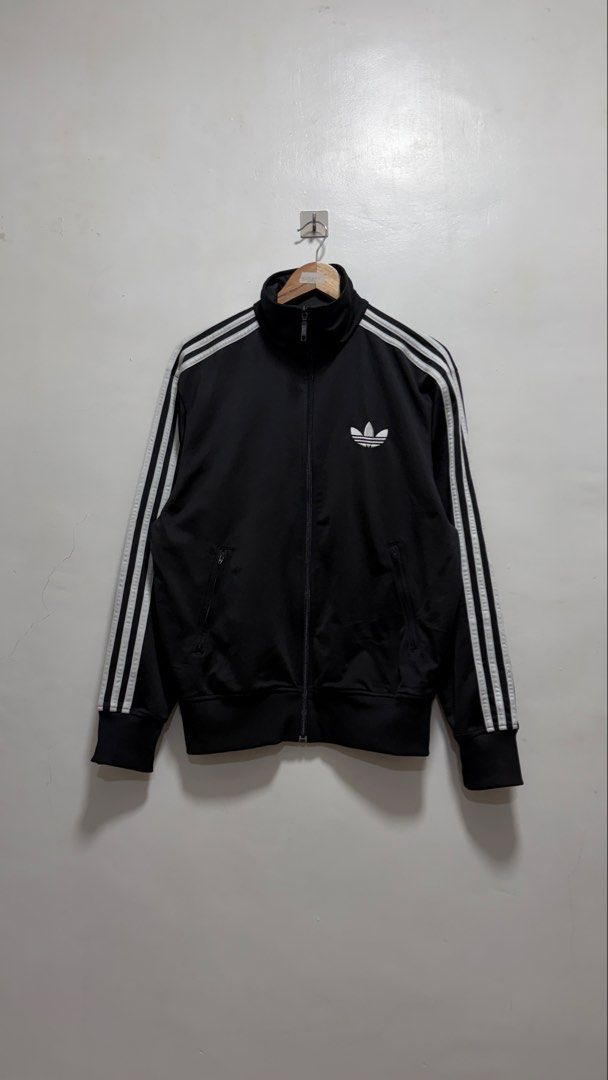Adidas Firebird Black Track Jacket (Category: Coats, Jackets and Outerwear) located in Manila. Submitted by petlover777 (Listing ID 1464585196, Image 1). Description: Size medium to large (21.5 x 27) GOOD AS NEW! NO ISSUE 📍Pick up location: Barangay 235 Hall Abad Santos Manila 🛵Delivery: J&t | Lalamove.