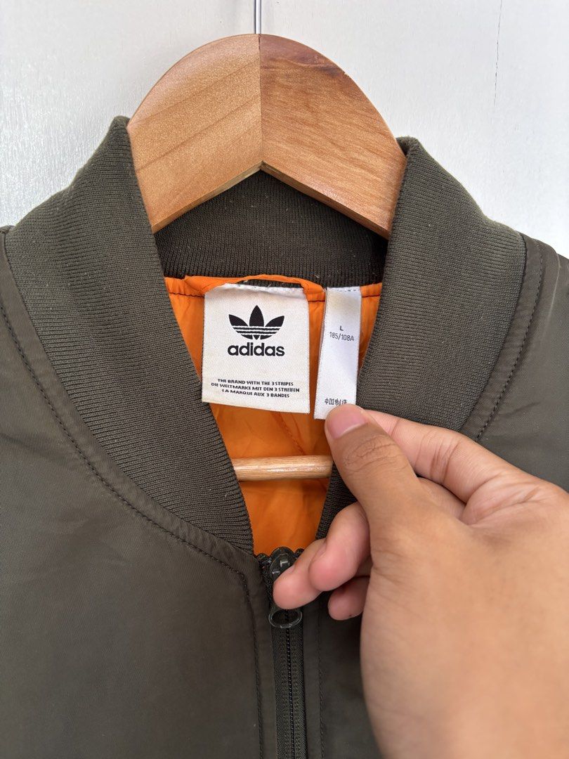 Adidas Graphic Bomber Jacket (Category: Coats, Jackets and Outerwear) located in Manila. Submitted by josh_trbs (Listing ID 1464648217, Image 2). Description: .