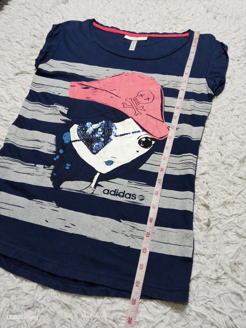 Adidas graphic pirate with a sparkling sequin eyepatch. (Category: Shirts) located in Manila. Submitted by lexusthrift1995 (Listing ID 1464725024, Image 3). Description: Size- MEDIUM on tag but fit to SMALL Dimension- 14x24.5 Color rate- 9/10 Condition- 9/10 issue- no issue good condition ‼️150.pesos plus shipping fee 💸MODE OF PAYMENT- GCASH payment first 🚛MODE OF DELIVERY- J&T or LALAMOVE 📍LOCATION- NORTH CALOOCAN CAMARIN BRGY.177 1705 SUNFLO