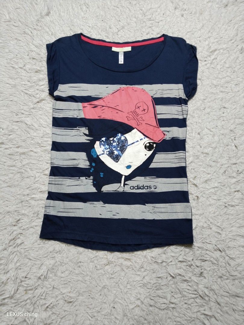 Adidas graphic pirate with a sparkling sequin eyepatch. (Category: Shirts) located in Manila. Submitted by lexusthrift1995 (Listing ID 1464725024, Image 1). Description: Size- MEDIUM on tag but fit to SMALL Dimension- 14x24.5 Color rate- 9/10 Condition- 9/10 issue- no issue good condition ‼️150.pesos plus shipping fee 💸MODE OF PAYMENT- GCASH payment first 🚛MODE OF DELIVERY- J&T or LALAMOVE 📍LOCATION- NORTH CALOOCAN CAMARIN BRGY.177 1705 SUNFLO