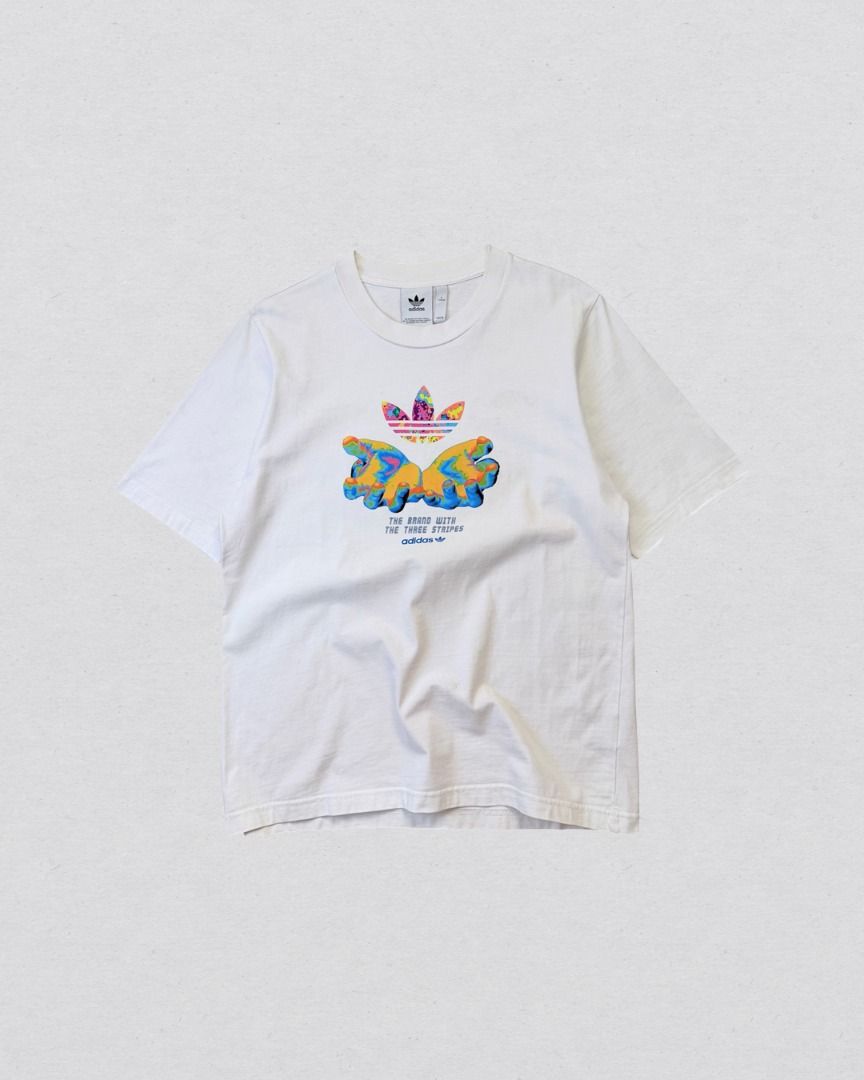 Adidas Graphic tee shirt (Category: Tshirts & Polo Shirts ) located in Cabanatuan. Submitted by argarments.ph (Listing ID 1464634577, Image 1). Description: Tagged: Small on tag, fits medium Width 21.5" | Length 28.5" Condition: Great condition Issue(s): Small dirt stain. see photos.