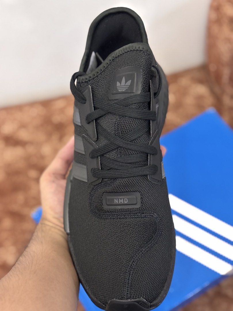 Adidas NMD (Category: Casual Shoes) located in Taguig. Submitted by kai.exe (Listing ID 1464711556, Image 3). Description: Adidas NMD (Triple black) Size 10.5 US, 44 Euro Brandnew and Original Open for nego.