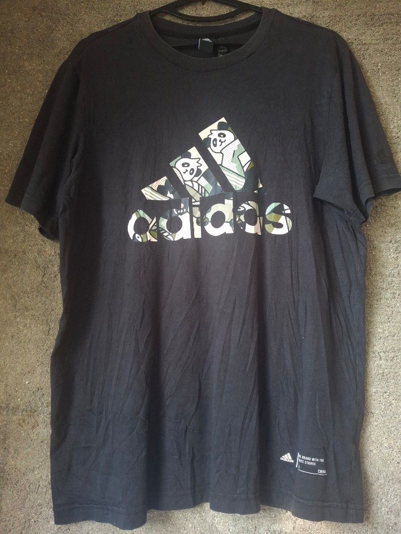 ADIDAS PANDA CHILL CAMO GRAPHIC TSHIRT (Category: Tshirts & Polo Shirts ) located in Cavite. Submitted by adynnej.various.items (Listing ID 1464624331, Image 1). Description: W: 21 L: 27 COLOR RATE: 9/10.