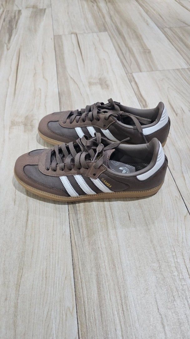 Adidas Samba Brown White Stripes Sneakers (Category: Sneakers) located in Makati City. Submitted by goldenbird.001 (Listing ID 1464576338, Image 2). Description: - Brown Adidas Samba sneakers - Classic design - Size: 7.5 UK - Please check photos for condition - worn once only.