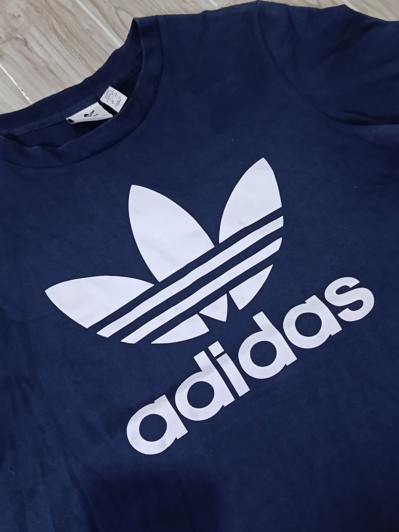ADIDAS TREFOIL TSHIRT (freeshipping) (Category: Shirts) located in Quezon City. Submitted by gyl-stop (Listing ID 1464691607, Image 3). Description: free shipping 18.5 x 24 excellent condi cr: 9.8/10 issue: none.