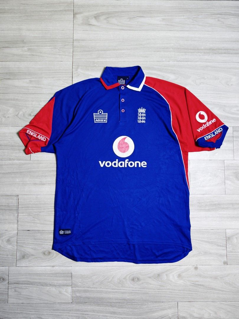 Admiral England Jersey Vodafone Admiral (Category: Activewear) located in Paranaque City. Submitted by pickersform (Listing ID 1464676255, Image 1). Description: - Authentic England Admiral Jersey Vodafone - Features ECB Logo - Size: Large can do XL dimes 24x31 - Design: Red and blue with 'England' text on sleeves - Ideal for any passionate England Admiral supporter check pics for details .