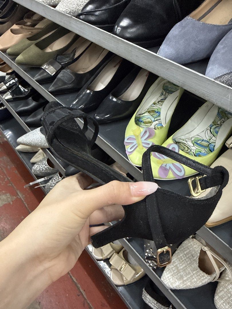 Aesta Black Suede Ankle Strap Heels Size 23.0 (Category: Heels) located in Manila. Submitted by fastlion.584bdf (Listing ID 1464733884, Image 1). Description: - Style: Classic black suede heels with slim heel and open toe design - Features: Ankle strap with secure buckle closure - Size & Origin: Marked 23.0, made in China - Condition: Pre-owned with scuffs on the soles and slight fabric wear - Versatility: Timeless piece that pairs easily with mu