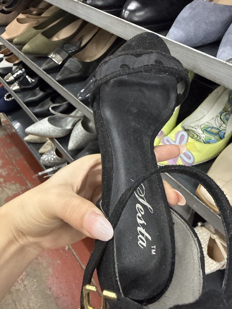 Aesta Black Suede Ankle Strap Heels Size 23.0 (Category: Heels) located in Manila. Submitted by fastlion.584bdf (Listing ID 1464733884, Image 2). Description: - Style: Classic black suede heels with slim heel and open toe design - Features: Ankle strap with secure buckle closure - Size & Origin: Marked 23.0, made in China - Condition: Pre-owned with scuffs on the soles and slight fabric wear - Versatility: Timeless piece that pairs easily with mu