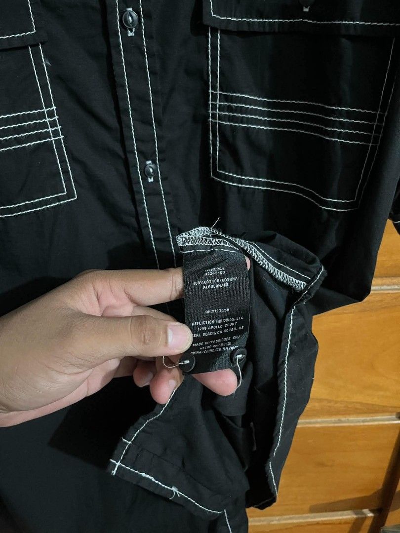 Affliction Dark Polo Shirt (Category: Tshirts & Polo Shirts ) located in Bacolod City. Submitted by decayed_outlet (Listing ID 1464593154, Image 3). Description: Dimension : 24x32.5 100% Cotton By Affliction Color :Black Condition : Pristine Color rate : 100000/10 For Baggy Chicano Fits (PSG if not Taken).