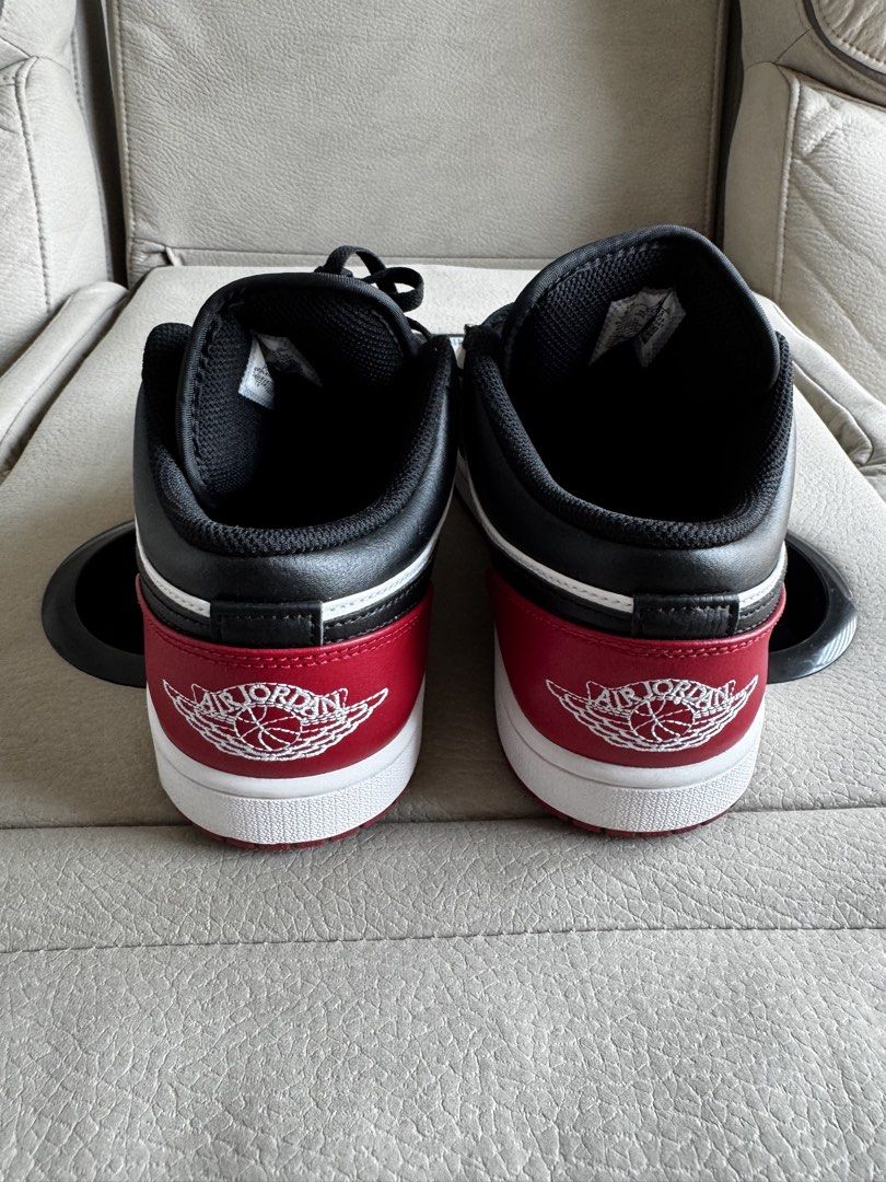 Air Jordan 1 Low Chicago Black Toe (Category: Sneakers) located in Pasig City. Submitted by funnelboy (Listing ID 1464615336, Image 3). Description: - Classic Air Jordan 1 Low - US 8.5Y - Chicago Black Toe colorway - Black, white, and red leather construction - Iconic silhouette - Ideal for everyday wear - Great for sneaker collectors - Essential for any sneaker enthusiast.