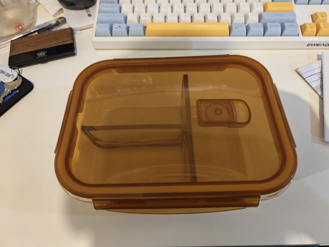 Amber Transparent Lunch Box with 2 Compartments (Avail before 9/29) (Category: Food Organization & Storage) located in Manila. Submitted by oddowl-a357 (Listing ID 1464662631, Image 1). Description: - Amber colored lunch box - Two internal compartments - Secure, leak-proof lid - Ideal for packing lunches for work or school - Simple to clean.