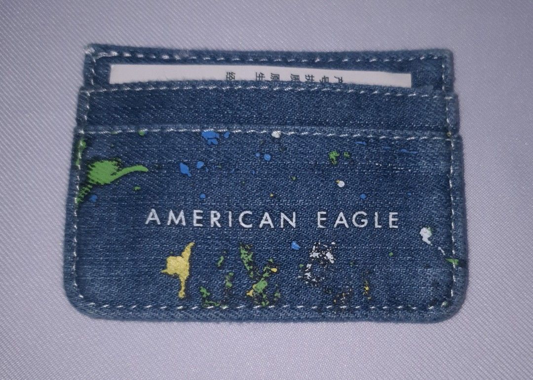 American Eagle Denim Cardholder with Paint Splatter Design (Category: Wallets & Card holders) located in Baguio. Submitted by missyjhen81 (Listing ID 1464670713, Image 1). Description: 📝📷Products and Photos and Information • Onhand • Actual photos • Clean items • Accurate sizes • Fast replies • Careful packing • Honest descriptions *Product color image may slightly differ due to lighting. 💳Payment Methods • GCASH • Maya • BPI Bank Transfer NOT